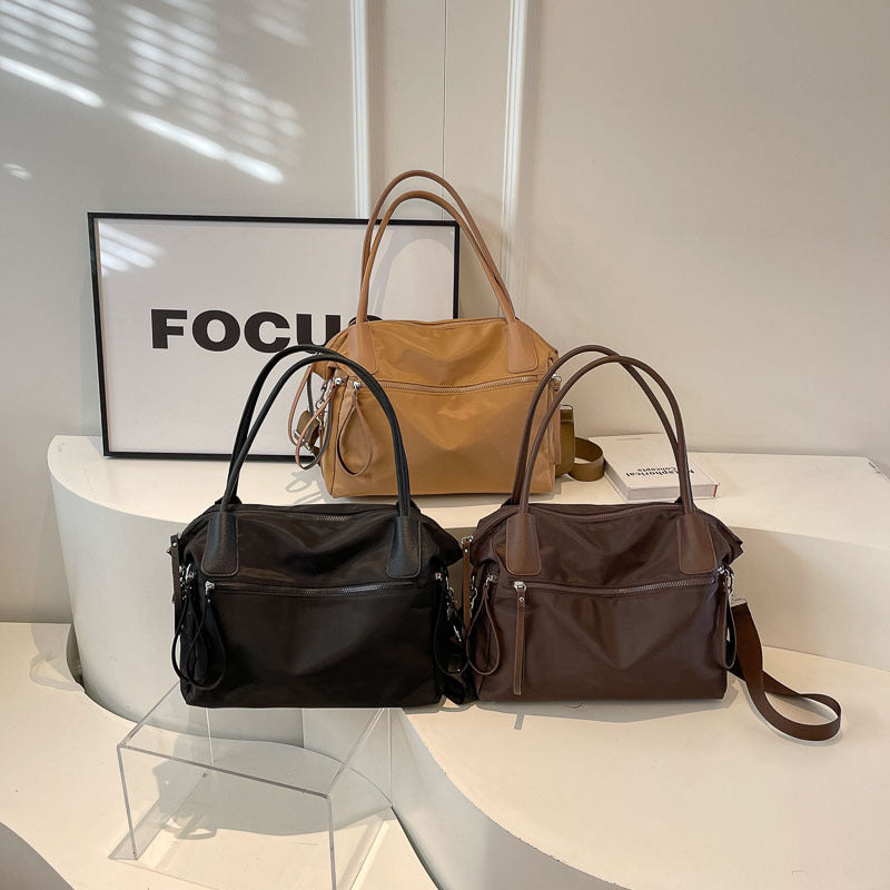 Bolso de mano minimalista de color sólido