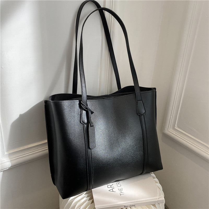 Bolso de mano de cuero suave de gran capacidad