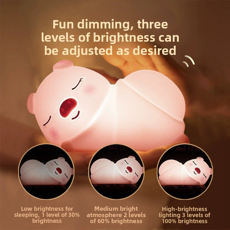 Luz nocturna de silicona Creative Pig con carga USB