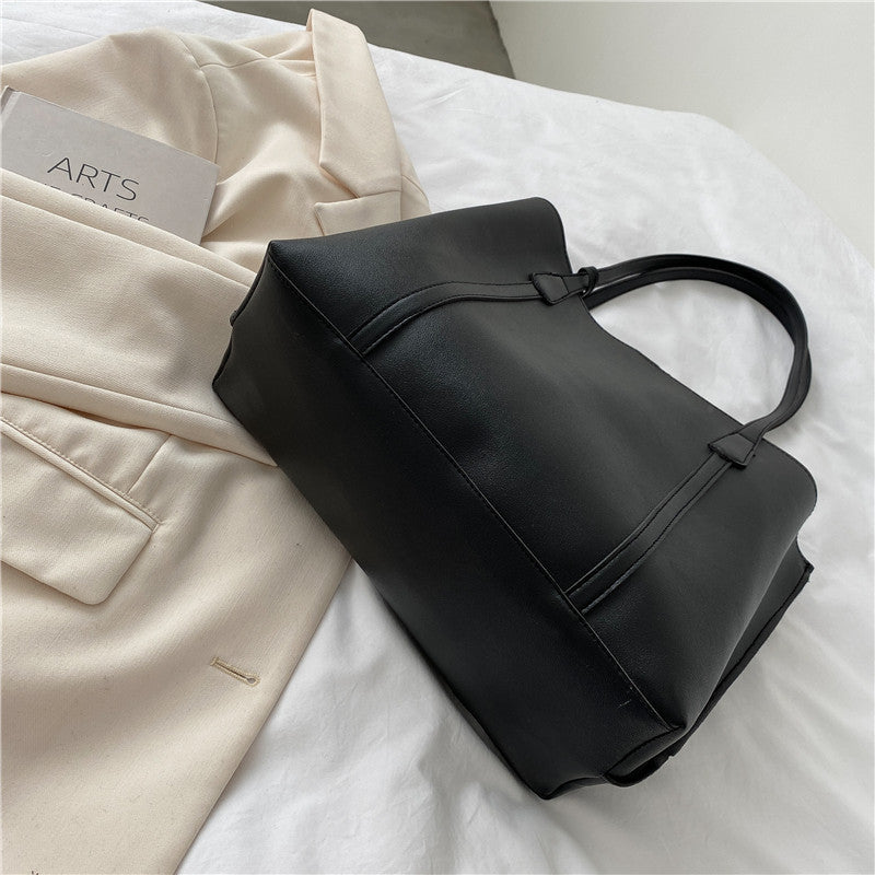 Bolso de mano de cuero suave de gran capacidad