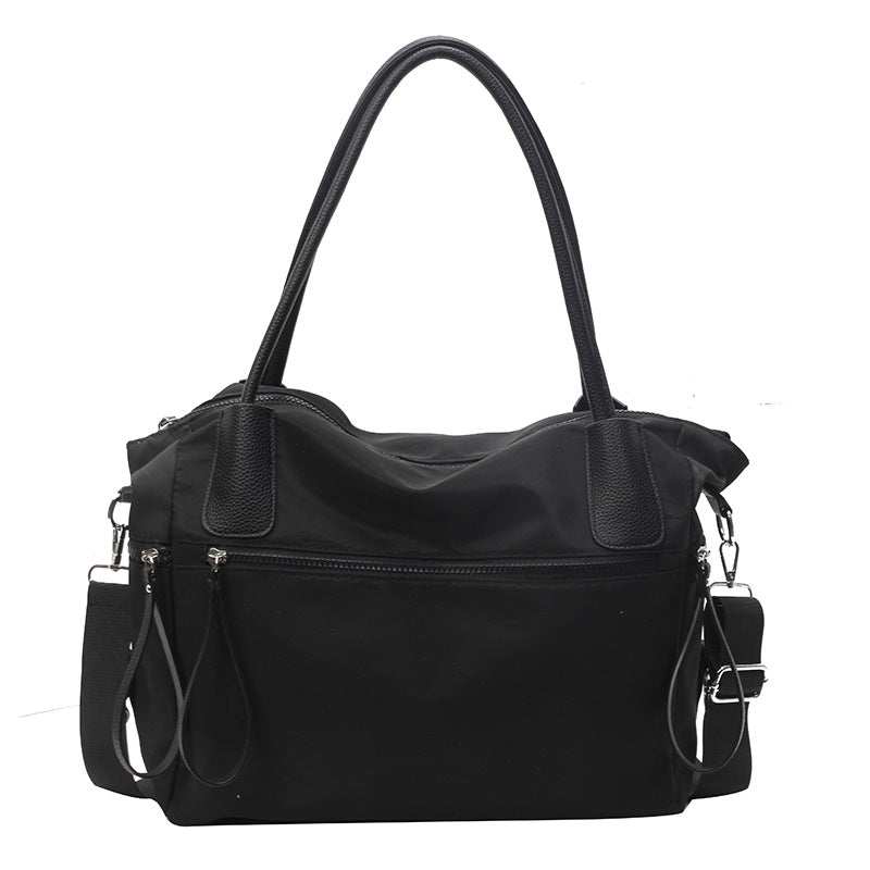 Bolso de mano minimalista de color sólido