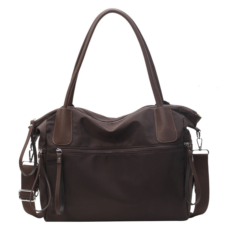 Bolso de mano minimalista de color sólido