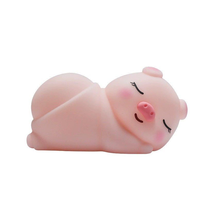 Luz nocturna de silicona Creative Pig con carga USB