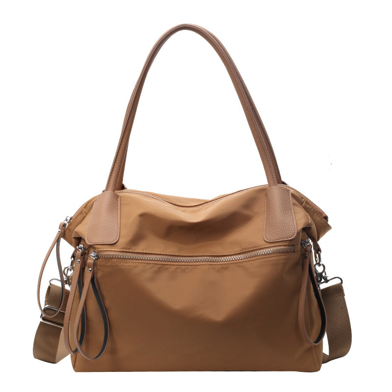 Bolso de mano minimalista de color sólido