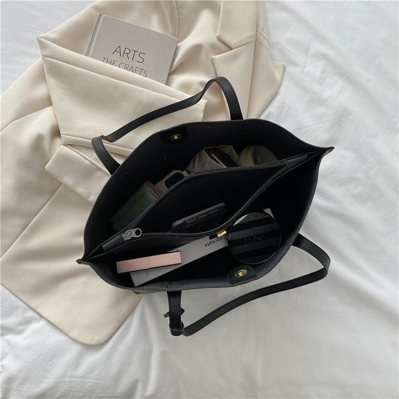 Bolso de mano de cuero suave de gran capacidad