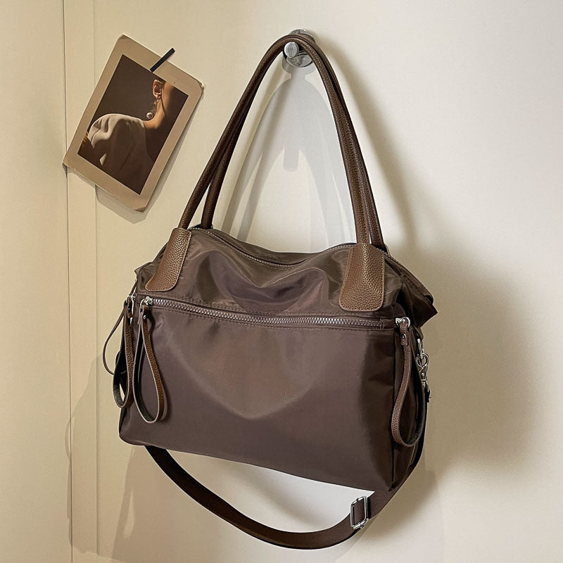 Bolso de mano minimalista de color sólido