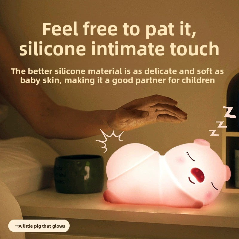 Luz nocturna de silicona Creative Pig con carga USB
